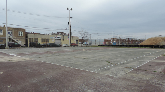 The fenced-in Lanier Playground on the block at 29th and Tasker streets before its renovation