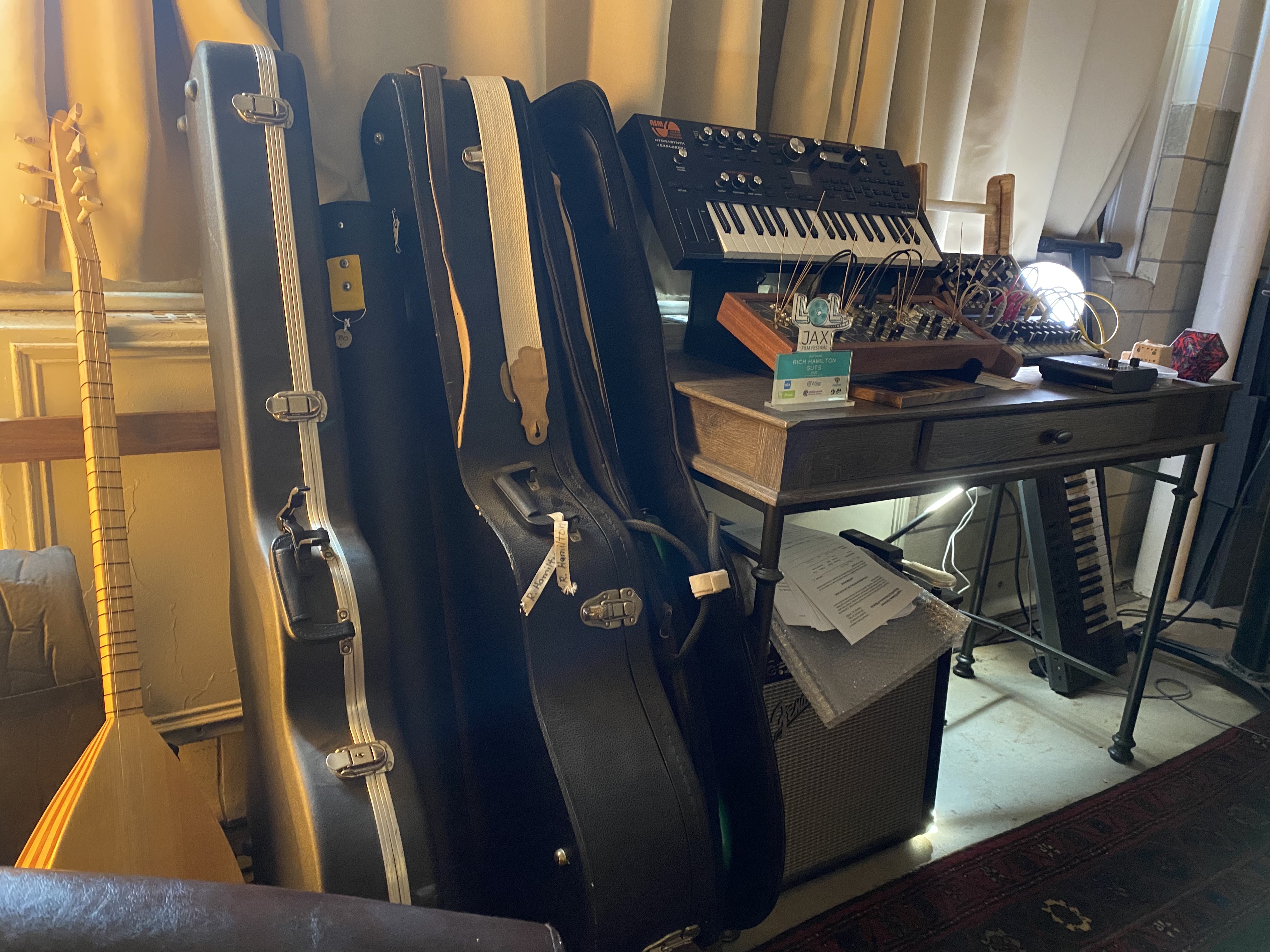 Assorted guitars and sound recording equipment in Rich Hamilton's audio studio.