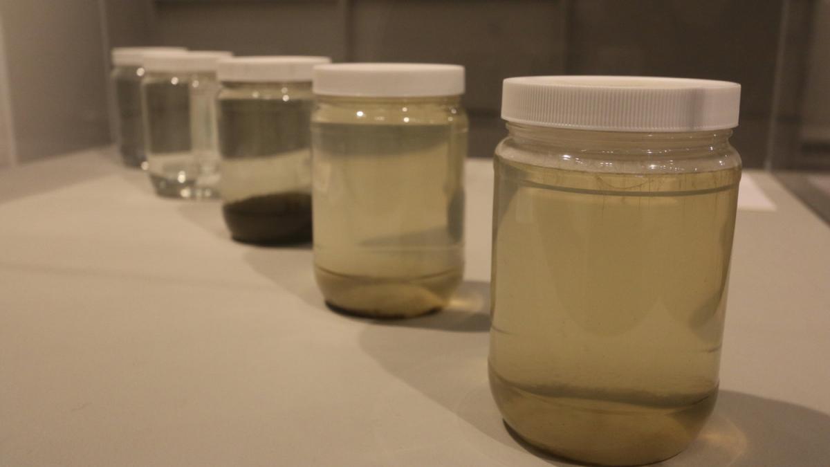 Wastewater at various stages of processing, exhibited at University of Western Florida, 2017. Photo by FICTILIS.