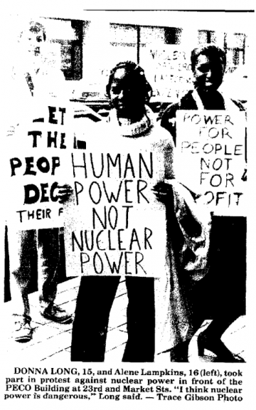 Two Black teenage girls protest against nuclear power